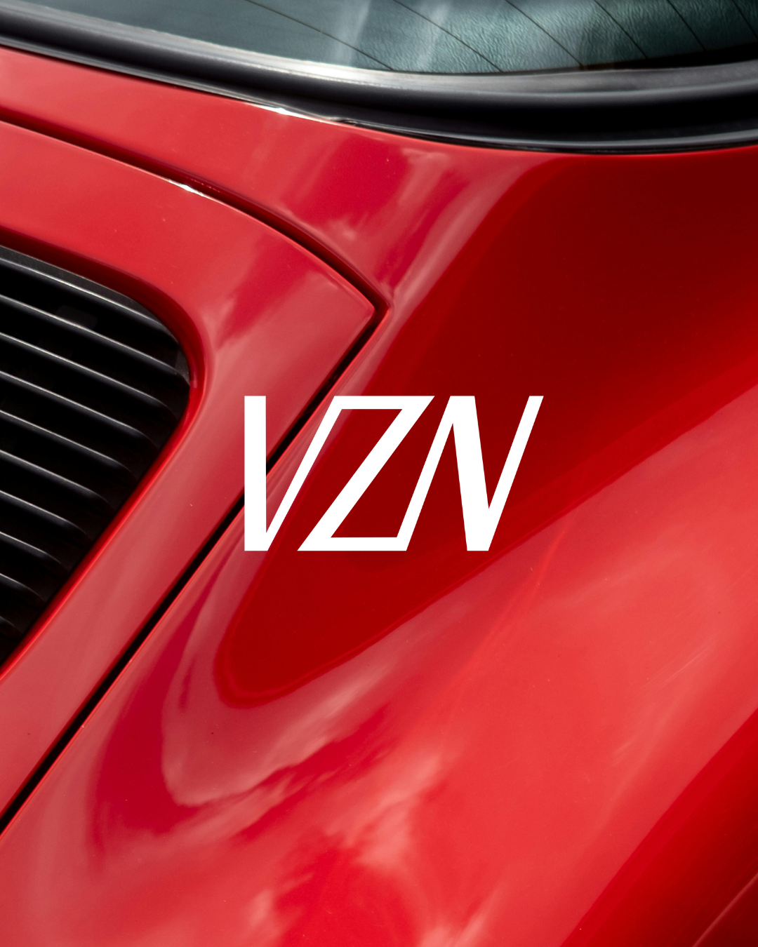VZN logo on top of a red Porsche 911
